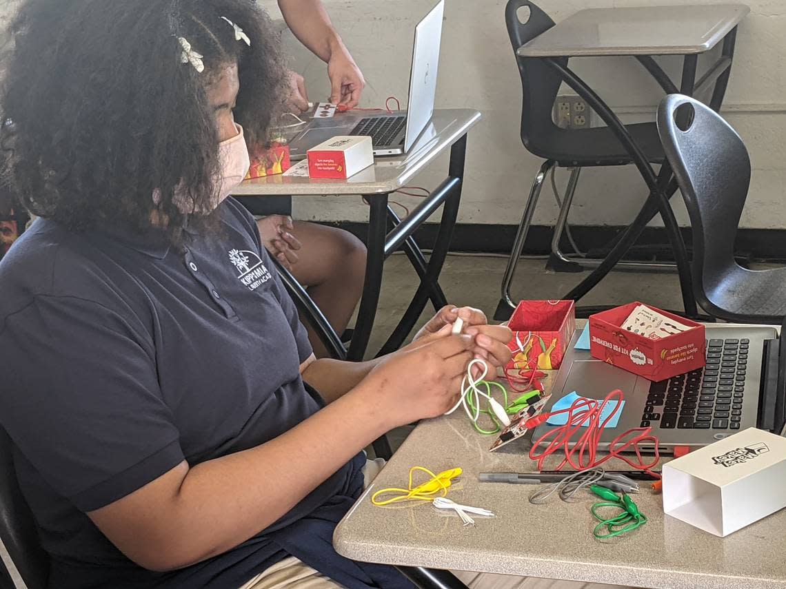 A young teen from KIPP Liberty Academy in Liberty City builds a robot using a Makey Makey kit. Fab Lab Miami STEAM programs at various locations are funded by The Children’s Trust.