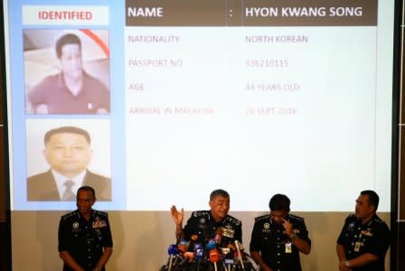 Malaysia's Royal Police Chief Khalid Abu Bakar (C) speaks next to a screen showing North Korean Hyon Kwang Song during a news conference regarding the apparent assassination of Kim Jong Nam, the half-brother of the North Korean leader, at the Malaysian police headquarters in Kuala Lumpur, Malaysia, February 22, 2017. REUTERS/Athit Perawongmetha