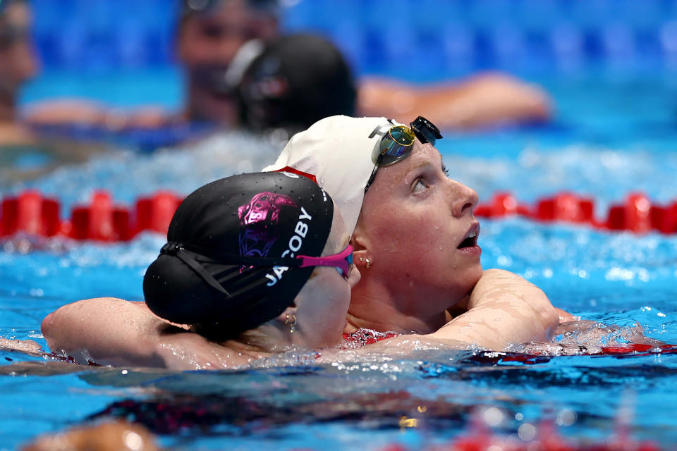 INDIANAPOLIS, INDIANA - JUNE 17: (R-L) Lilly King and Lydia Jacoby of the United States react after the Women's 100m breaststroke final on Day Three of the 2024 U.S. Olympic Team Swimming Trials at Lucas Oil Stadium on June 17, 2024 in Indianapolis, Indiana. (Photo by Maddie Meyer/Getty Images)