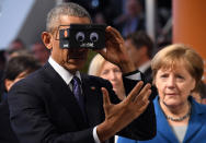 <p>President Barack Obama and German Chancellor Angela Merkel test virtual reality glasses at the ifm electronics stand at the Hannover Messe industrial trade fair on April 25, 2016 in Hanover, Germany. This is likely Obama’s last trip to Germany as U.S. president. The Hannover Messe is the world’s largest industrial trade fair. (Alexander Koerner/Getty Images) </p>