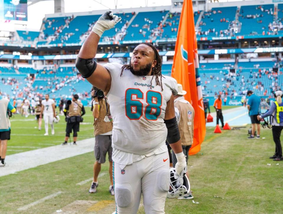 Miami Dolphins offensive tackle Robert Hunt (68) walks off the field after the Dolphins 30-15 win over the Houston Texans during an NFL football game at Hard Rock Stadium on Sunday, November 27, 2022 in Miami Gardens, Florida.