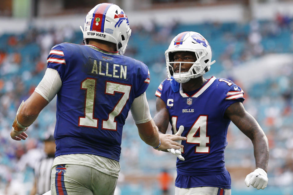 MIAMI GARDENS, FLORIDA - SEPTEMBER 19: Josh Allen #17 and Stefon Diggs #14 of the Buffalo Bills celebrate during the fourth quarter against the Miami Dolphins at Hard Rock Stadium on September 19, 2021 in Miami Gardens, Florida. (Photo by Michael Reaves/Getty Images)