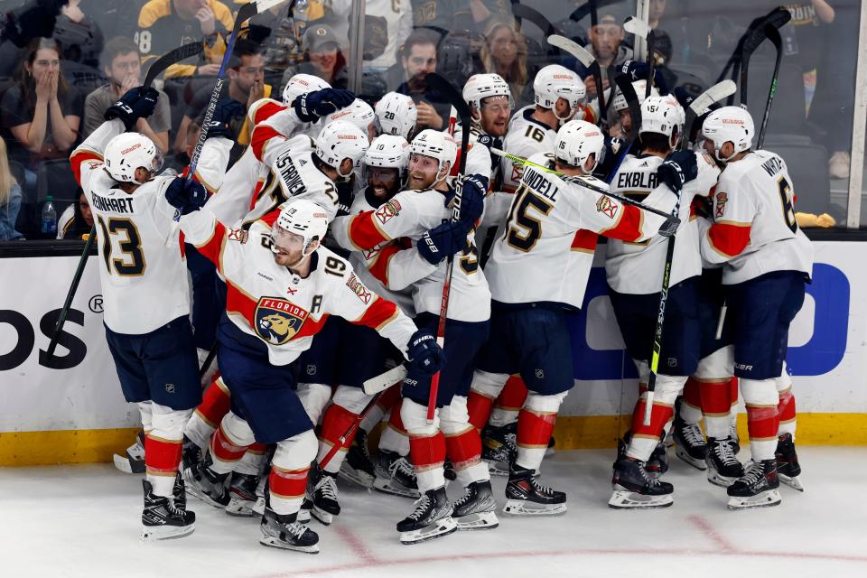 The Florida Panthers celebrate after defeating the Boston Bruins in overtime of Game 7.