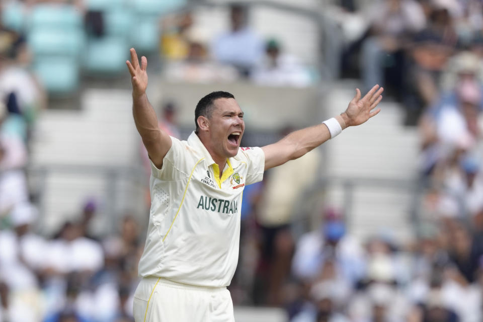 Australia's Scott Boland appeals for lbw on India's Ajinkya Rahane, but is was not given on the fifth day of the ICC World Test Championship Final between India and Australia at The Oval cricket ground in London, Sunday, June 11, 2023. (AP Photo/Kirsty Wigglesworth)
