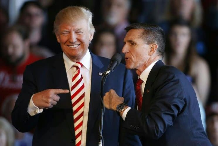 Donald Trump and Michael Flynn speak at a rally in Colorado in October. (Photo: AFP)