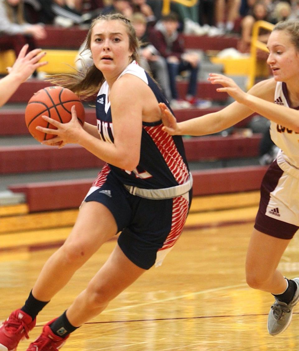 BNL sophomore Madisyn Bailey drives on Bloomington North's Emma McDivitt Friday. Bailey had 9 points, 7 rebounds and 7 steals in a 66-58 victory.