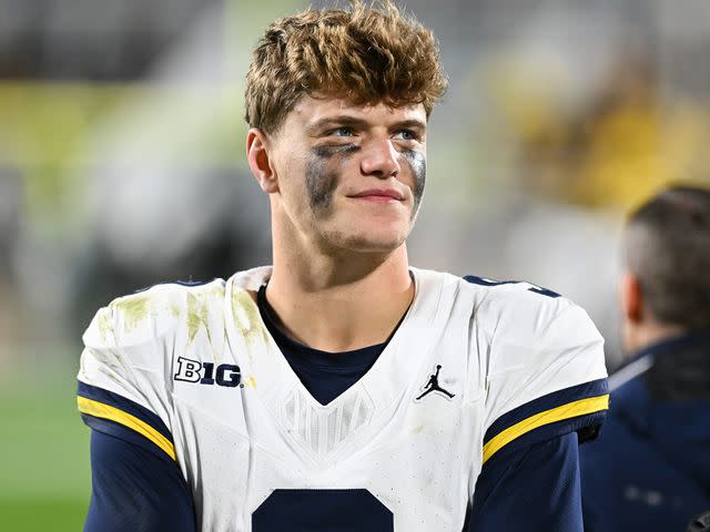 <p>Adam Ruff/Icon Sportswire/Getty</p> J.J. McCarthy in the waning moments of a college football game between the Michigan State Spartans and Michigan Wolverines on October 21, 2023.
