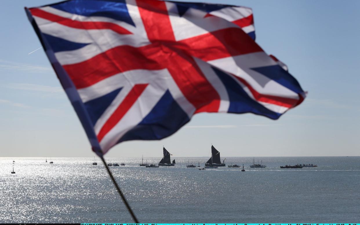  'Little Ships' are seen under a Union flag as they depart from Ramsgate for Dunkirk on May 21, 2015 in England. - 2015 Getty Images