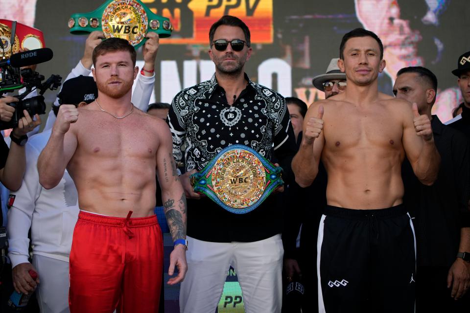 Saul ‘Canelo’ Alvarez (left) and rival Gennady Golovkin at the public weigh-ins (AP)