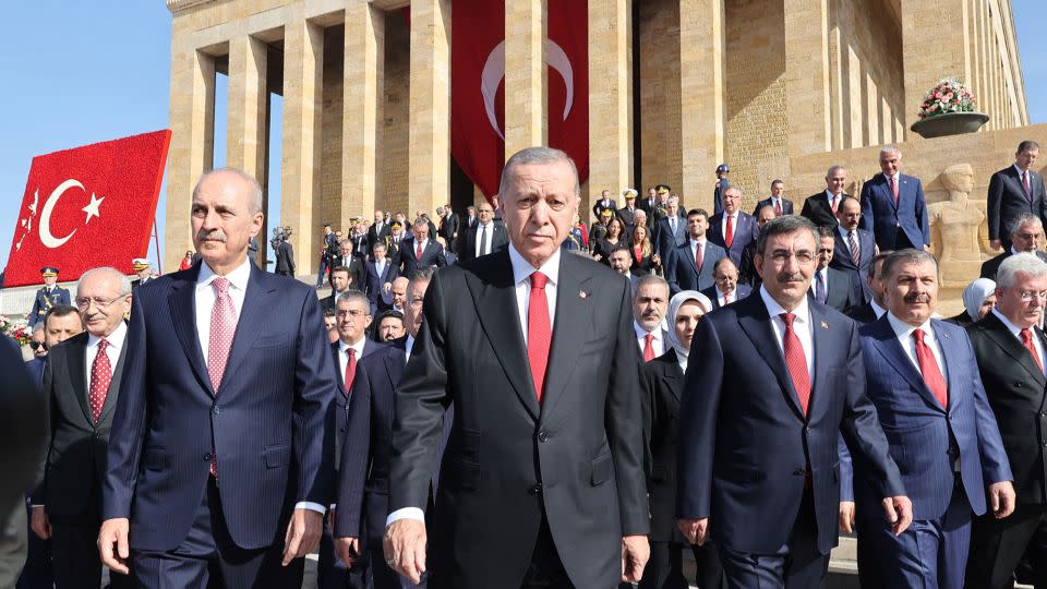 Turkish President Recep Tayyip Erdogan (C) and state officials visit Anitkabir, the mausoleum of Turkish Republic's Founder Mustafa Kemal Ataturk, to mark the 100th anniversary of Turkish Republic in Ankara, on Sunday. - Adem Altan/AFP/Getty Images