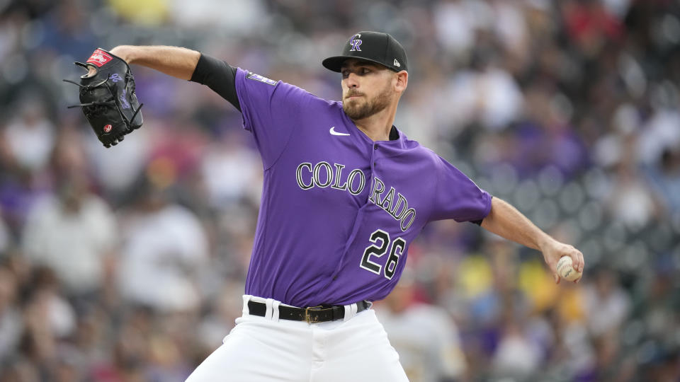 Colorado Rockies starting pitcher Austin Gomber works against the Milwaukee Brewers during the first inning of a baseball game Saturday, June 19, 2021, in Denver. (AP Photo/David Zalubowski)