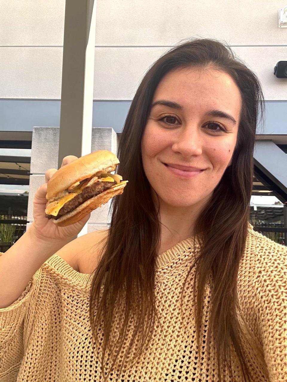 Anneta with Smashed Jack burger at Jack in the Box