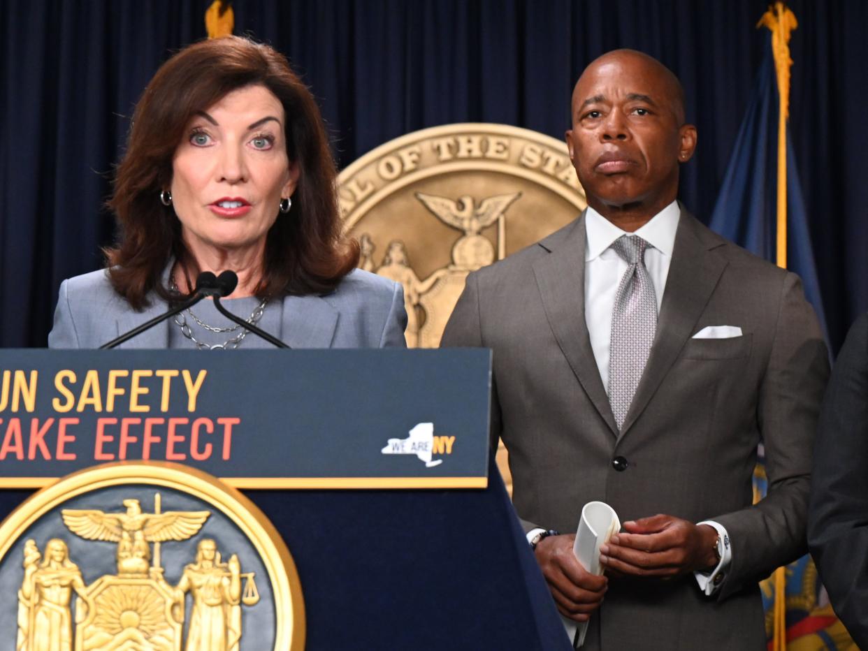New York Gov. Kathy Hochul (left) with New York City Mayor Eric Adams (right) during an announcement in Manhattan, New York, on Wednesday, Aug. 31, 2022, about new public safety actions ahead of new gun laws going into effect in New York state. 