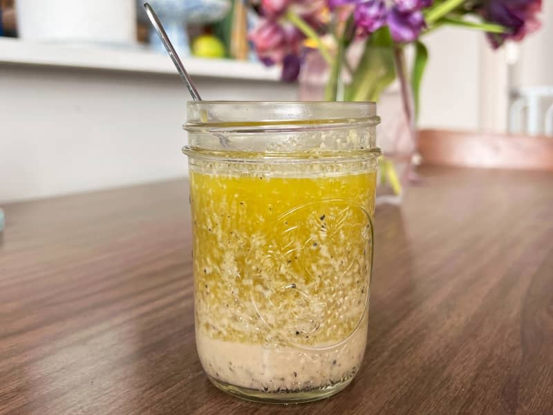 Homemade salad dressing in mason jar.