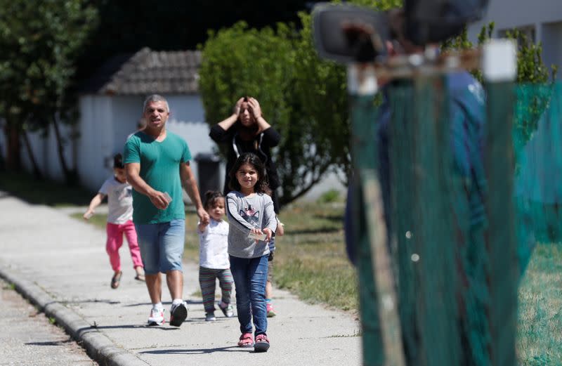 Migrants at a migrant reception centre in Vamosszabadi