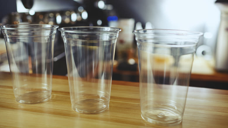 Three clear plastic cups