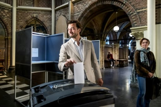 In The Netherlands, Flamboyant populist Thierry Baudet (C) is on course to beat Prime Minister Mark Rutte's Liberals