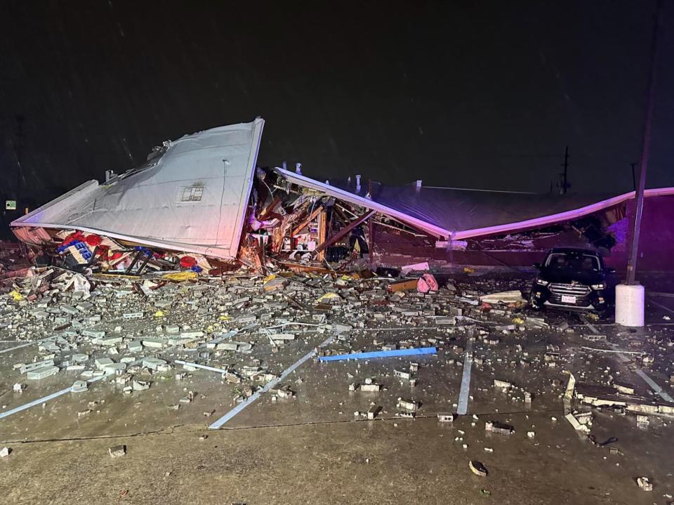 A building is reduced to rubble after severe storms hit Katy, Texas on 10 April (Harris County Fire Department)