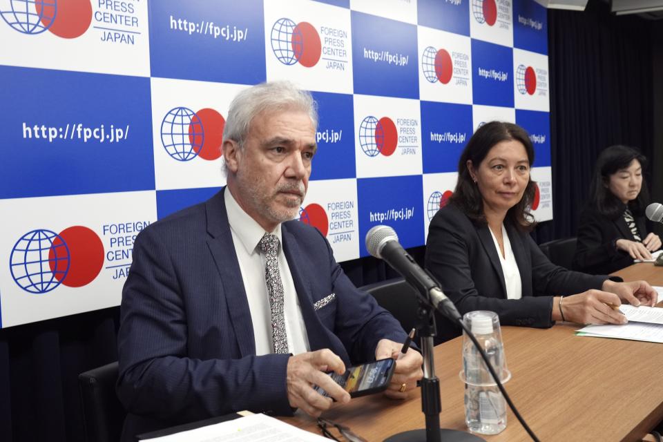 Lydie Evrard, right, the International Atomic Energy Agency (IAEA) Deputy Director General and head of the Department of Nuclear Safety and Security and Gustavo Caruso, Director and Coordinator for the ALPS Safety Review of IAEA Department of Nuclear Safety and Security, prepare to attend a press conference at the Foreign Press Center Japan Monday, Oct. 23, 2023, in Tokyo. (AP Photo/Eugene Hoshiko)