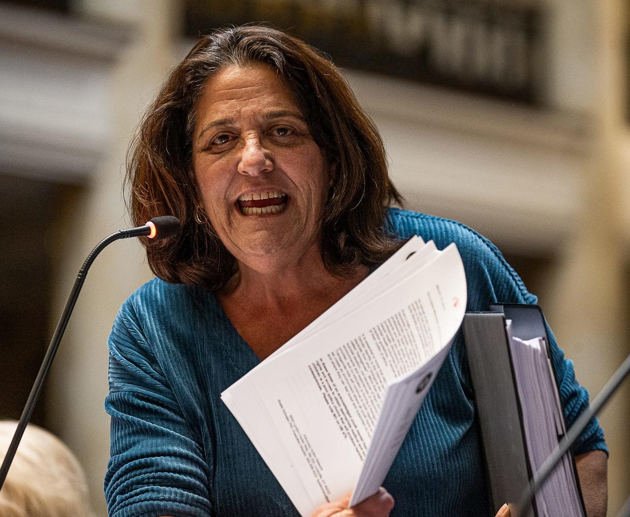 Senator Karen Berg held up medical literature while speaking out against SB 150 after voting against the measure banning gender-affirming care for transgender children in Kentucky. The bill passed the Senate by a 30-7 vote and will now head to the desk of Gov. Andy Beshear. Mar. 16, 2023