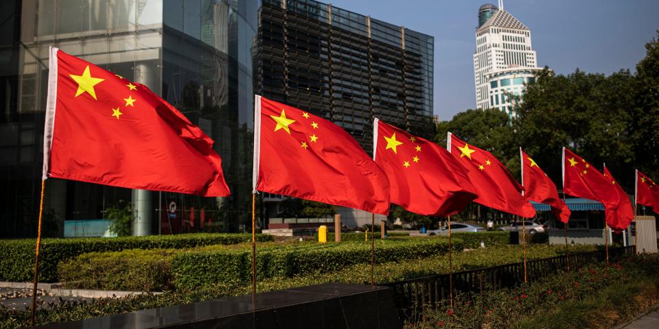 The national flag of China is displayed in a street in Wuhan, Hubei province, China.