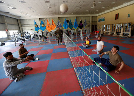 Wounded members of Afghanistan's National Army (ANA) practice for Invictus Games competition, at the Kabul Military Training Centre (KMTC) in Kabul, Afghanistan July 4, 2017. REUTERS/Mohammad Ismail