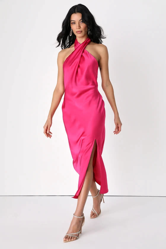 woman wars Beyond Classy Hot Pink Satin Halter Midi Dress. 