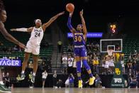 Baylor guard Sarah Andrews (24) defends against a 3-point shot by Morehead State's Terri Smith (30) during the first half of an NCAA college basketball game in Waco, Texas, Tuesday, Nov. 30, 2021. (AP Photo/Tony Gutierrez)