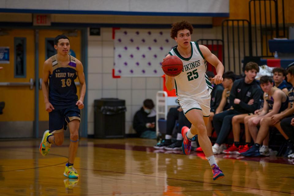 Sunnyslope’s Elijah Saunders dribbles the ball as Desert Vista’s Jio Tapia follows in the MLK Dream Classic, hosted at McClintock High School in Tempe on Jan. 17, 2022.