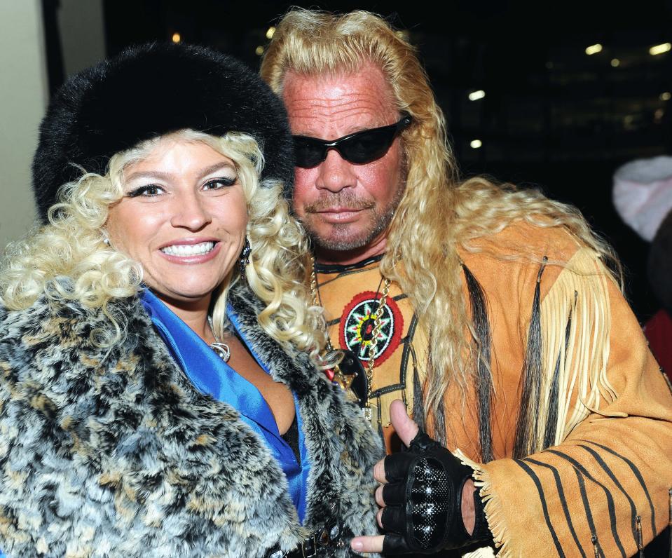 Duane 'Dog' Chapman, with Beth Smith, left, attends the Hollywood Christmas Parade on Sunday Nov. 29, 2009 in Los Angeles. (AP Photo/Earl Gibson III)