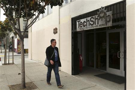 A man walks past TechShop in the South of Market neighborhood in San Francisco, California April 24, 2014. REUTERS/Robert Galbraith