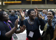 Delegates celebrate after Zimbabwean President Robert Mugabe was dismissed as party leader at an extraordinary meeting of the ruling ZANU-PF's central committee in Harare, Zimbabwe November 19, 2017. REUTERS/Philimon Bulawayo