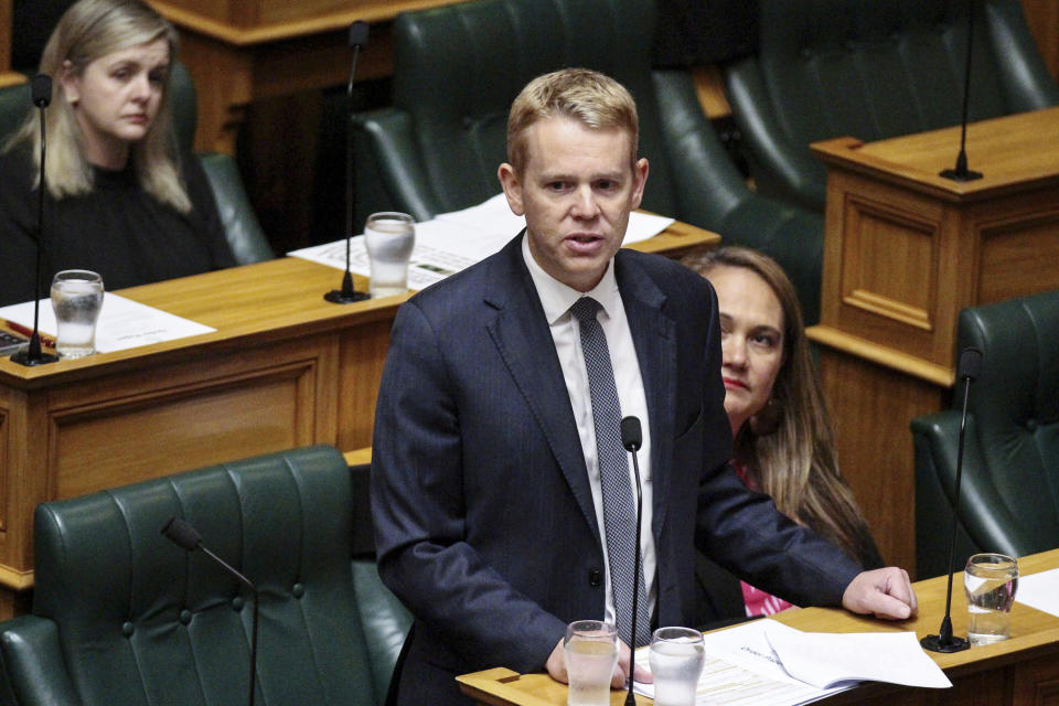 New Zealand Prime Minister Chris Hipkins delivers his statement to Parliament on the first day of the house sitting after the summer recess in Wellington, New Zealand, Tuesday, Feb. 21, 2023. Hipkins says the nation needs to rebuild more resilient infrastructure in the aftermath of last week's cyclone to cope with more frequent and intense weather events. (Jed Bradley/NZ Herald via AP)