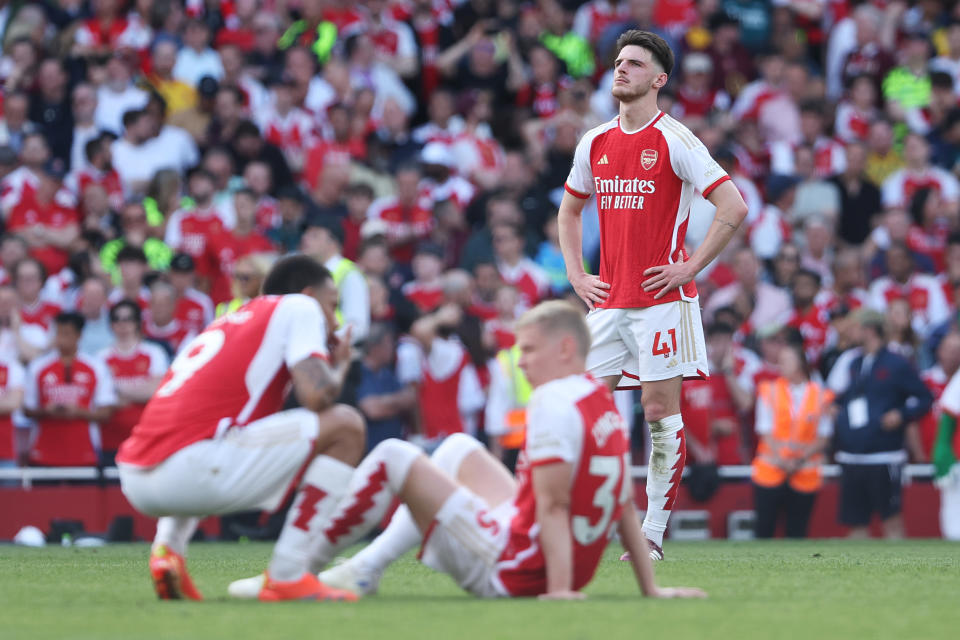 Arsenal midfielder Declan Rice (right) looks dejected following the English Premier League match against Everton. 