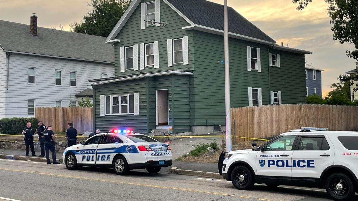 Worcester police investigate a shooting on Cambridge Street, where a woman was shot dead and another person was injured by gunfire Saturday.