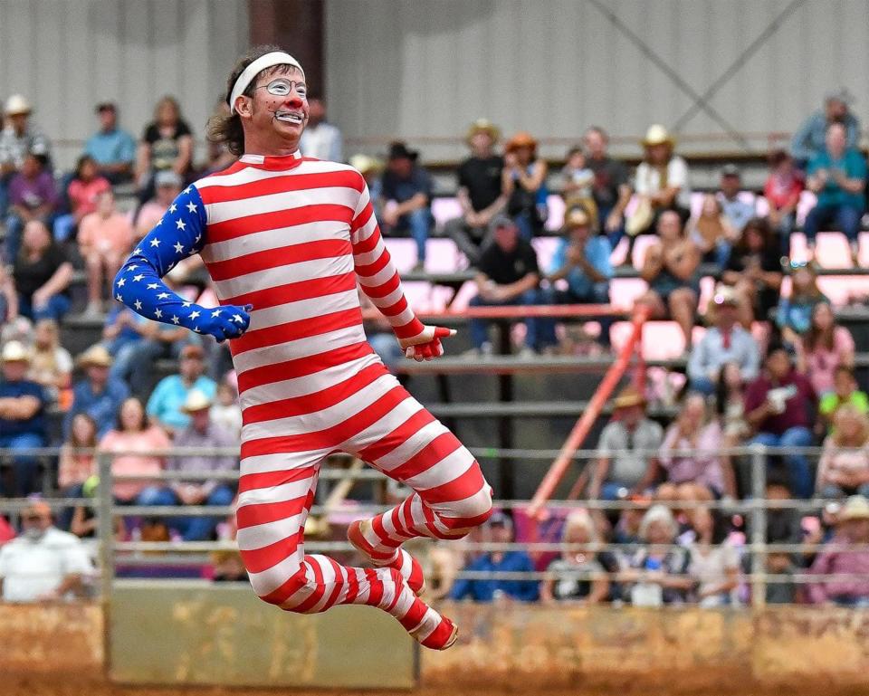 John Harrison does a lot of improv comedy as he clowns around on the rodeo dirt.