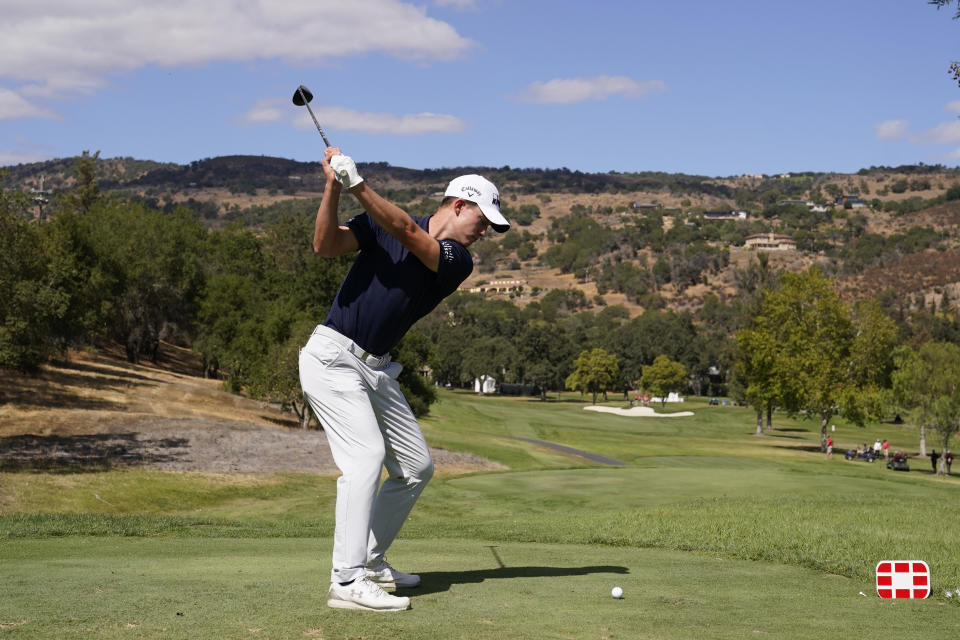 Maverick McNealy hits from the fourth tee of the Silverado Resort North Course during the final round of the Fortinet Championship PGA golf tournament Sunday, Sept. 19, 2021, in Napa, Calif. (AP Photo/Eric Risberg)