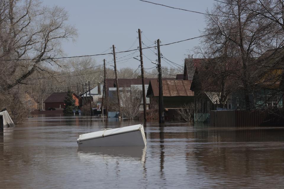 A refrigerator floats in a flooded area in Orenburg, Russia, on Thursday, April 11, 2024. Russian officials are scrambling to help homeowners displaced by floods, as water levels have risen in the Ural River. The river's water level in the city of Orenburg was above 10 meters (33 feet) Wednesday, state news agency Ria Novosti reported, citing the regional governor. (AP Photo)