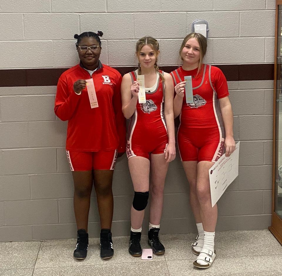 Bosse sophomore wrestlers Abrianna Hillaire (left), Millie Christie (center) and Lauren Trail (right).