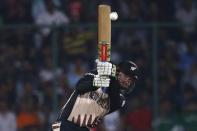 Cricket - England v New Zealand - World Twenty20 cricket tournament semi-final - New Delhi, India - 30/03/2016. New Zealand's Colin Munro plays a shot. REUTERS/Adnan Abidi