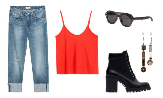 Lily shows her boyish side of style sporting a simple tank, boyfriend jeans, and combat boots. Add a pair of geometric earrings and sunglasses to finish the look. 