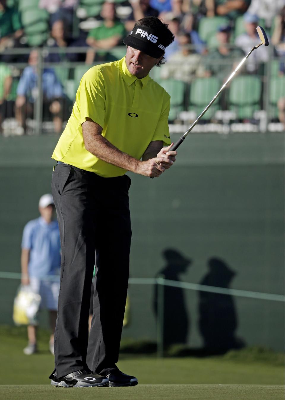 Bubba Watson misses a birdie putt on the 17th hole during the first round of the Masters golf tournament Thursday, April 10, 2014, in Augusta, Ga. (AP Photo/Chris Carlson)