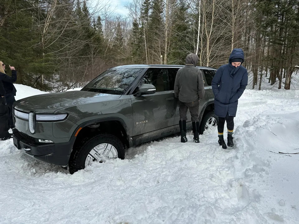 Chase Merrill's Rivian stuck in a snow drift.