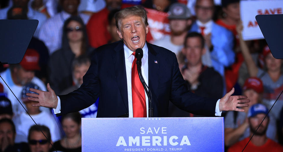 Donald Trump during a rally in Alabama, US, where he was booed for telling supporters to get vaccinated against Covid-19.