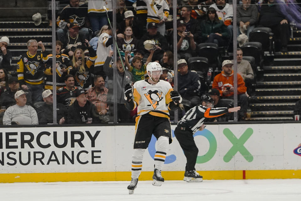 Pittsburgh Penguins left wing Radim Zohorna celebrates after scoring during the first period of an NHL hockey game against the Anaheim Ducks Tuesday, Nov. 7, 2023, in Anaheim, Calif. (AP Photo/Ryan Sun)