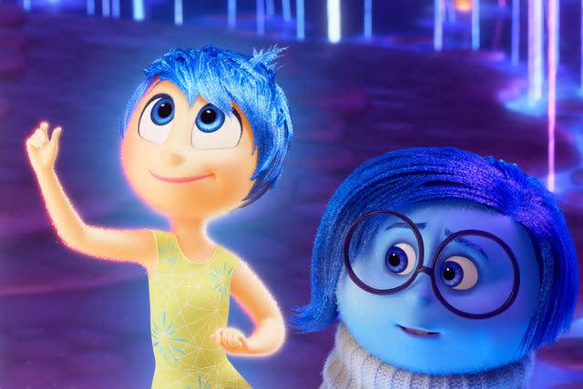 <p>Disney/Pixar</p> Joy (voice of Amy Poehler) and Sadness (Phyllis Smith) in 'Inside Out 2'