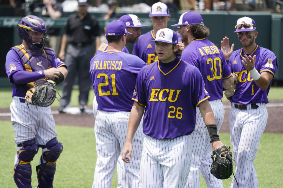 East Carolina starting pitcher Gavin Williams (26) walks to the dugout after being taken out in the eighth inning of an NCAA college baseball super regional game against Vanderbilt, Friday, June 11, 2021, in Nashville, Tenn. Vanderbilt won 2-0. (AP Photo/Mark Humphrey)