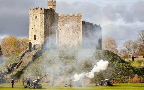 Army Reservists from 104 Regiment Royal Artillery fire a 21-gun salute at Cardiff Castle, to mark the Prince of Wales' 70th birthday - Credit: PA