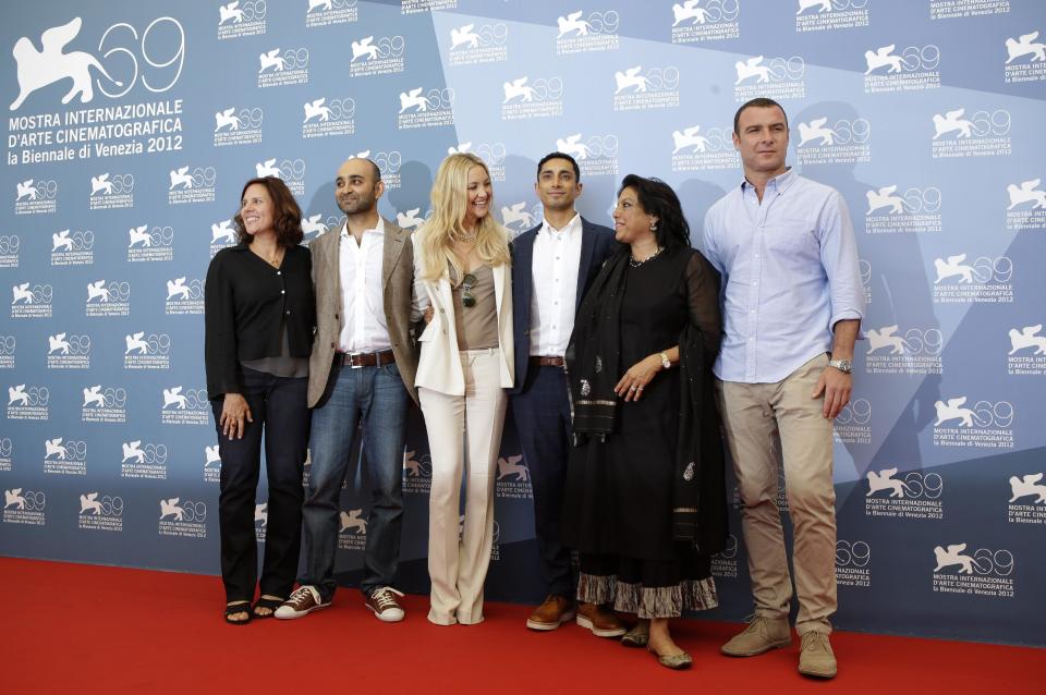 From left, producer Lydia Dean Pilcher, writer Mohsin Hamid, actress Kate Hudson, actor Riz Ahmed, director Mira Nair, and actor Liev Schreiber pose during the photo call for the movie 'The reluctant Fundamentalist' at the 69th edition of the Venice Film Festival in Venice, Italy, Wednesday, Aug. 29, 2012. (AP Photo/Andrew Medichini)