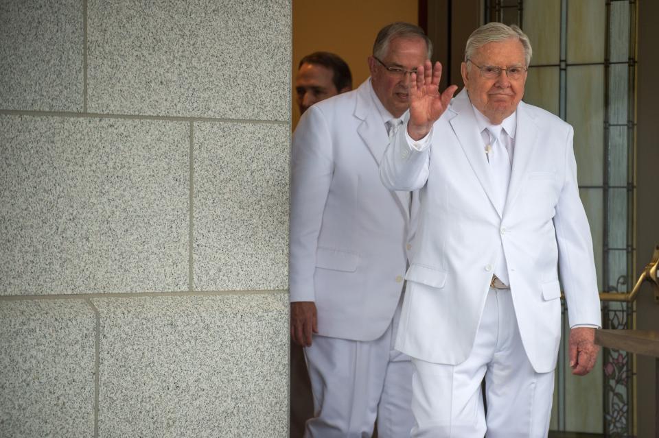 President M. Russell Ballard waves to the crowd during the temple dedication ceremony at The Church of Jesus Christ of Latter-day Saints temple in Pocatello, Idaho.